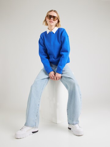 ABOUT YOU Sweatshirt 'Daniela' in Blue