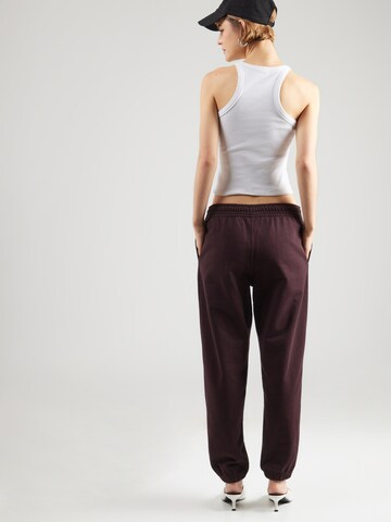 Effilé Pantalon Calvin Klein Jeans en violet