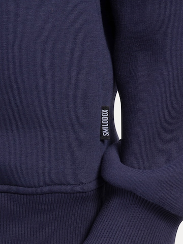 Veste de survêtement 'Jago' Smilodox en bleu