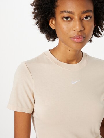 T-shirt fonctionnel 'Essential' Nike Sportswear en beige