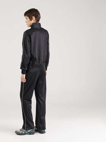 Champion Authentic Athletic Apparel Tracksuit in Black