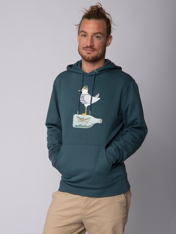 Sweat-shirt ' Möwe mit Hut ' Watapparel en bleu : devant