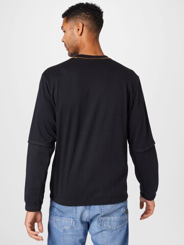 ADIDAS SPORTSWEAR Sport sweatshirt 'TRVL' i svart