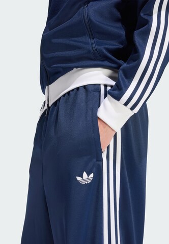 ADIDAS ORIGINALS Loose fit Trousers 'Adicolor' in Blue