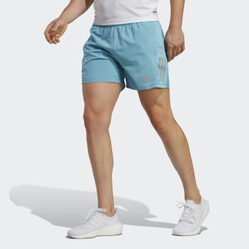 Regular Pantalon de sport 'Own the Run' ADIDAS SPORTSWEAR en bleu : devant