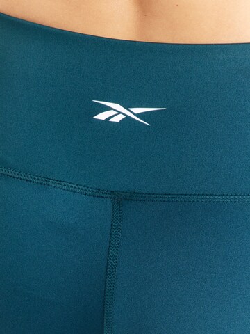 Skinny Pantaloni sportivi 'ID TRAIN' di Reebok in verde