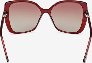 Lunettes de soleil GUESS en rouge