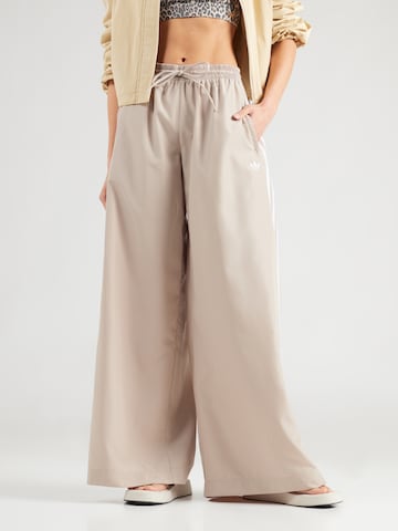 ADIDAS ORIGINALS Wide leg Trousers 'Firebird Adilenium' in Green: front