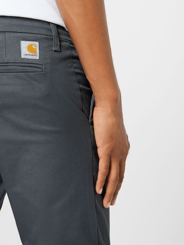 Carhartt WIP Úzky strih Džínsy 'Sid' - Sivá