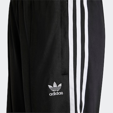 ADIDAS ORIGINALS Lużny krój Spodnie 'Adicolor Wide' w kolorze czarny