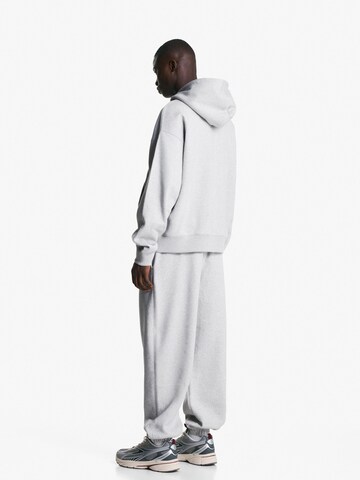 Tapered Pantaloni di Bershka in grigio