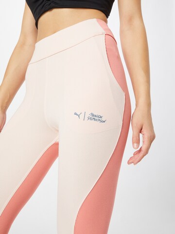 PUMA Skinny Sports trousers in Pink