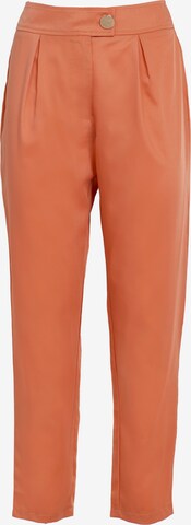 Pantaloni di Influencer in arancione: frontale