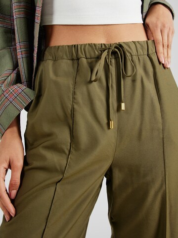 ABOUT YOU Regular Pants 'Rose' in Green
