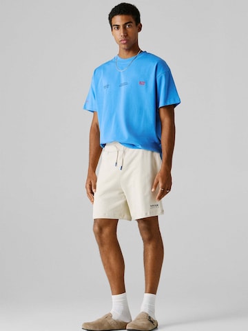 Red Bull Racing x Pepe Jeans Regular Trousers in Beige