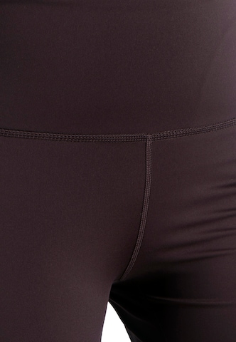 Athlecia Slim fit Workout Pants 'ALMY W' in Brown