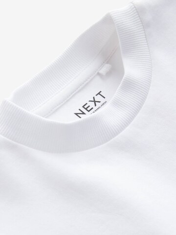 T-Shirt Next en blanc