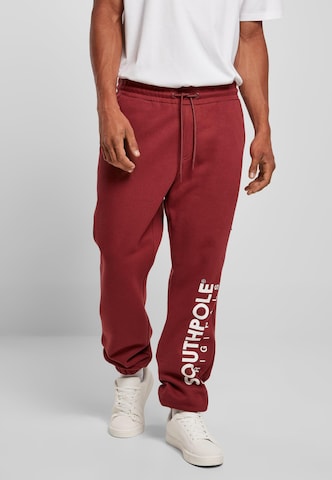 SOUTHPOLE Loose fit Pants in Red: front