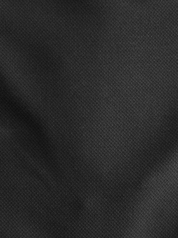 Skinny Pantaloni con piega frontale di Next in nero