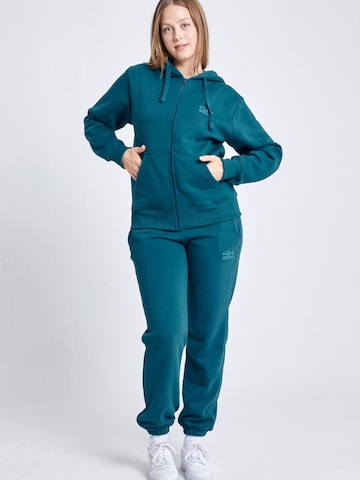 SPORTKIND Loose fit Workout Pants 'Jogging Pants' in Green: front