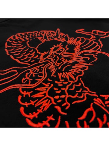 Pull-over 'Tatsu' DOLLY NOIRE en noir