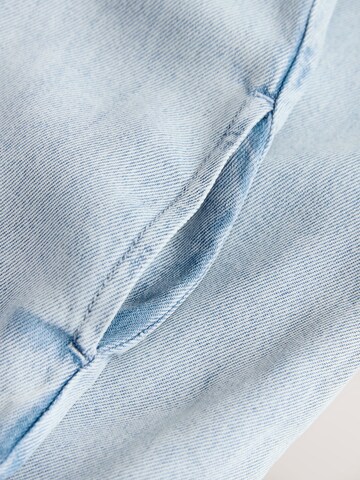 Next Overall in Blauw