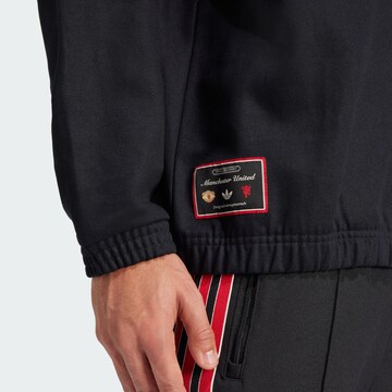 T-Shirt 'Manchester United Terrace Icons Drill' ADIDAS ORIGINALS en noir