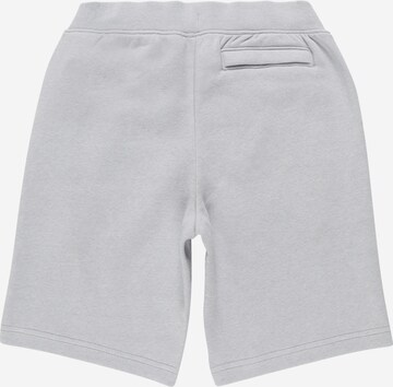 Regular Pantalon de sport 'Rival' UNDER ARMOUR en gris