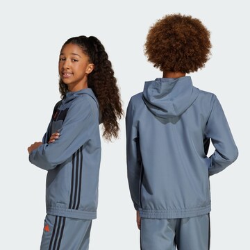Veste de survêtement 'Tiro 25 Essential' ADIDAS PERFORMANCE en bleu