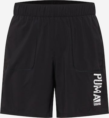 PUMA - Pantalón deportivo en negro: frente