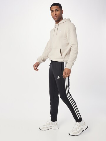 ADIDAS SPORTSWEAR Zúžený Sportovní kalhoty 'Essentials' – černá