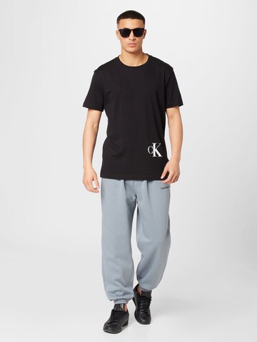 Calvin Klein Jeans Tapered Hose 'INSTITUTIONAL' in Grau