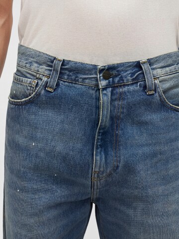 Carhartt WIP Lużny krój Jeansy 'Landon' w kolorze niebieski