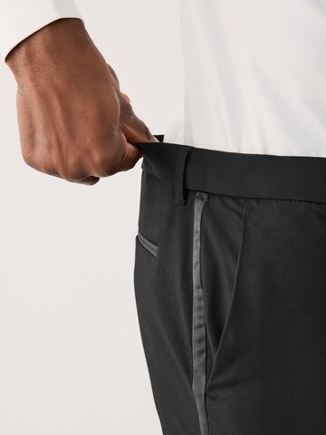 Next Обычный Плиссированные брюки 'Motionflex' в Черный