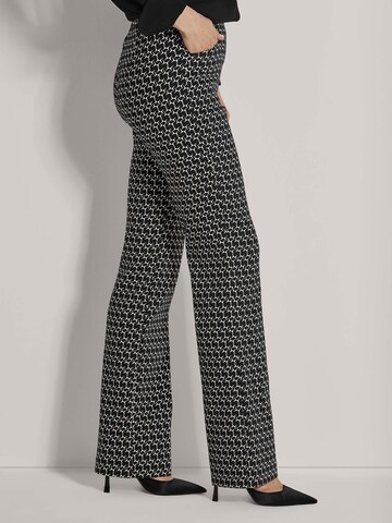 MADELEINE Flared Broek in Zwart