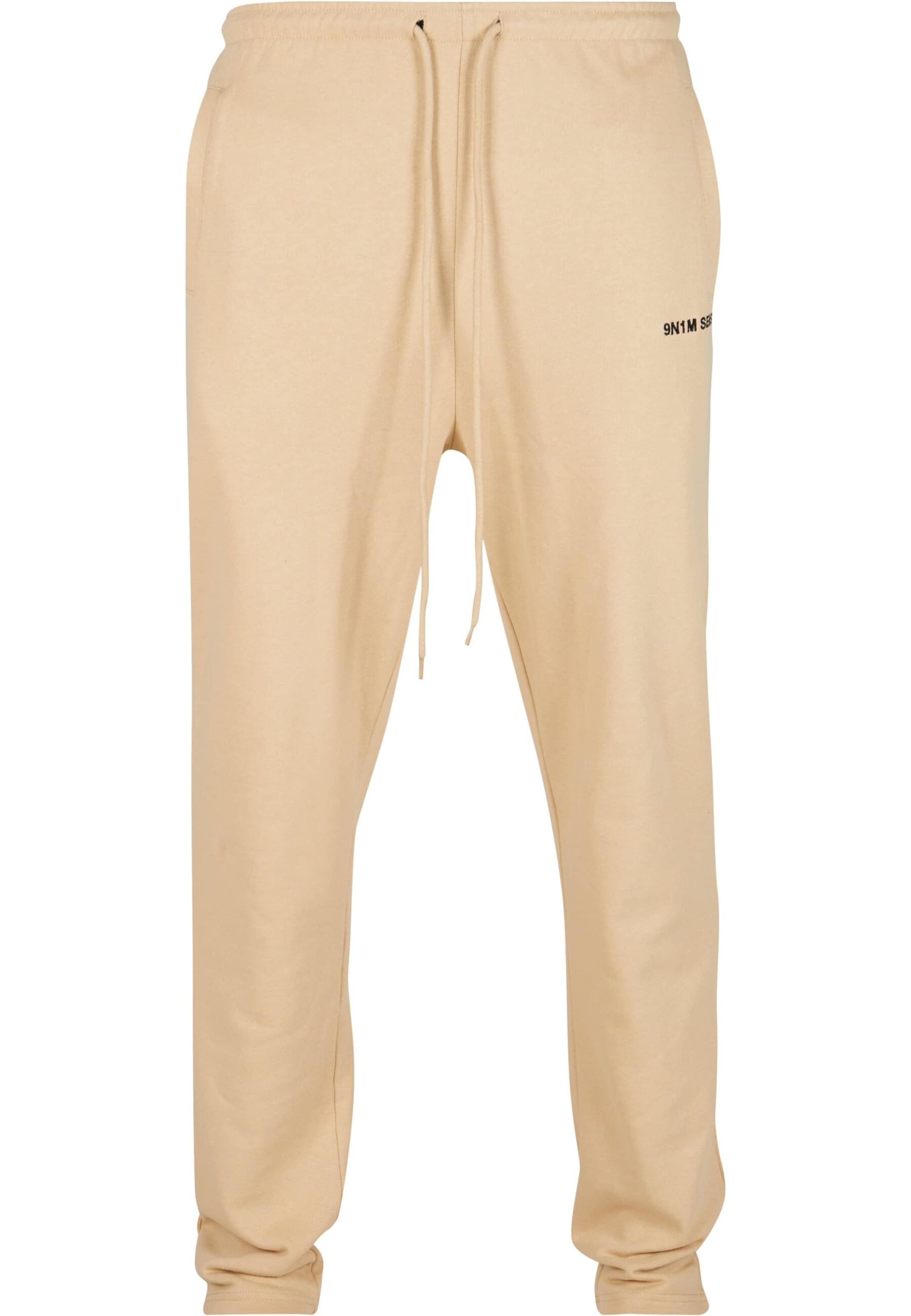 9N1M SENSE Lużny krój Spodnie 'Essential' w kolorze beżowy: przód