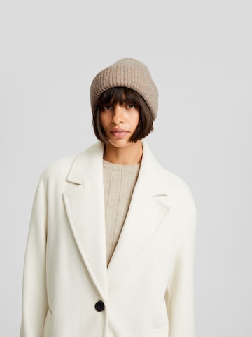 Bershka Mössa i beige