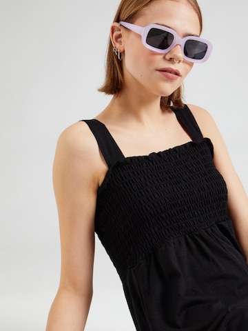 Tuta jumpsuit 'PASSING BY' di ROXY in nero