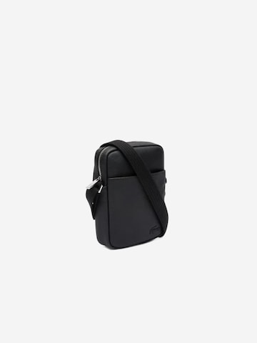 LACOSTE Skuldertaske 'Classic Homme' i sort