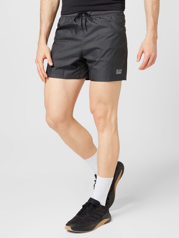 Regular Pantalon de sport 'Impact' new balance en gris : devant