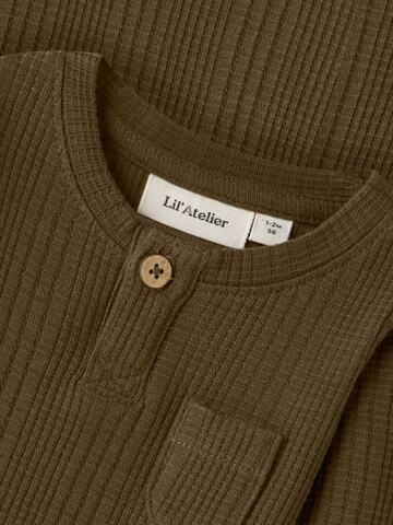 Tutina / body per bambino di Lil'Atelier in verde