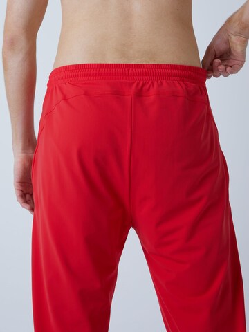 Coupe slim Pantalon de sport 'Slim Training Pants' SPORTKIND en rouge