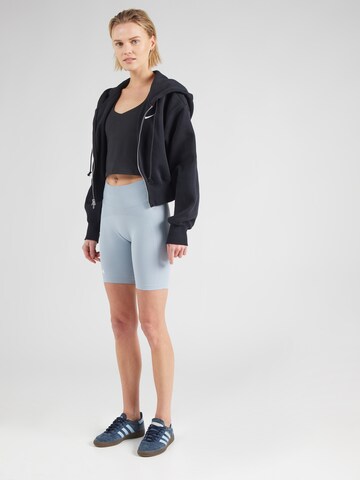 UNDER ARMOUR Skinny Spodnie sportowe w kolorze niebieski