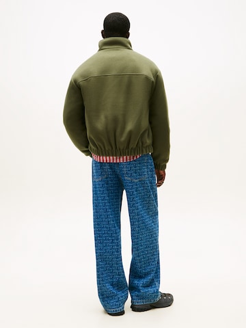 Tommy Jeans Between-season jacket 'ESSENTIAL' in Green