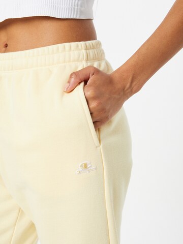 Champion Authentic Athletic Apparel - Tapered Pantalón en amarillo