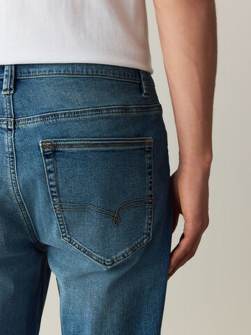 Next Ozke Kavbojke 'Motionflex' | modra barva