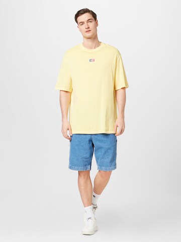 Tommy Jeans Μπλουζάκι σε κίτρινο