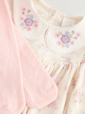 Tutina / body per bambino di Next in bianco
