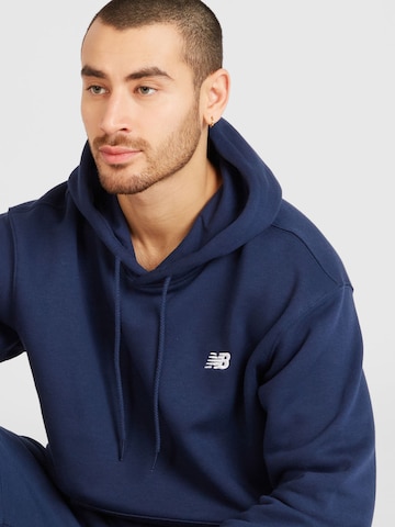 new balanceSweater majica 'Sport Essentials' - plava boja