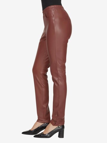 Skinny Leggings di heine in marrone